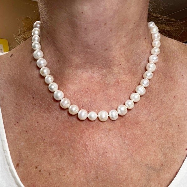 10mm White Potato Pearl Necklace, Knotted in between on Silk is 17 1/2" with a YGF Chain and Clasp finishing out the back. Free Shipping.