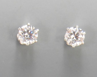 Sterling Silver 5 mm Cubic Zirconia 6 prong Post Earrings with Push back Ear nuts.