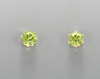 Yellow Gold Filled 4 mm Peridot 6 prong Post Earrings with Push back Ear Nuts.