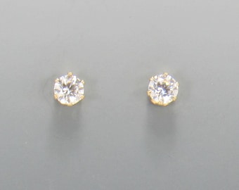 Yellow Gold Filled 4 mm Cubic Zirconia 6 prong Post Earrings with Push back Ear nuts.