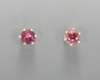 Sterling Silver 4mm Rhodolite Garnet 6 prong Post Earrings with Push back Ear nuts.