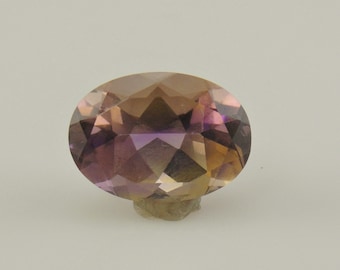 Large Oval Faceted Ametrine Loose Gemstone, Measures 12 x 18 x 9.5 mm and Weighs 12.64 ct. -S4