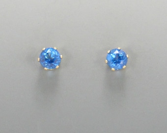 Yellow Gold Filled 4 mm Ice Blue Topaz 6 prong Post Earrings with Push back Ear nuts.