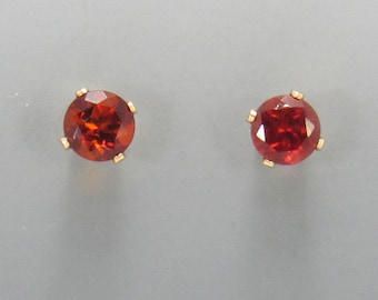 Yellow Gold Filled 5mm Garnets 4 prong Post Earrings with Push back Ear nuts.