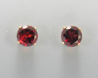 Yellow Gold Filled 6 mm Garnet 4 prong Post Earrings with Push back Ear nuts.