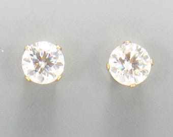 Yellow Gold Filled 6 mm Moissanites 4 prong Post Earrings with Push back Ear nuts.