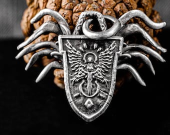 Dark-themed multi-legged spider shield pendant, sterling silver eerie emblem necklace