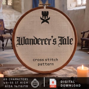 May include: A circular wooden embroidery hoop containing a beige fabric with black cross-stitch embroidery. The text reads Wanderer's Tale, cross stitch pattern, with a castle icon. Below, text specifies 69 characters, 49-55 st high, Aida 14/16/18.
