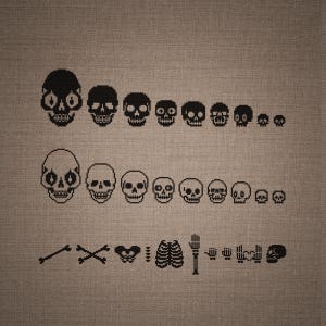 May include: A cross-stitch pattern on brown fabric featuring two horizontal rows of nine skulls in decreasing sizes. The top row is solid black, the middle row is outlined in black, and the bottom row displays various skeletal bones, hands, and a skull.