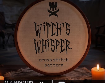 Op de afbeelding: Een ronde houten borduurring met een kruissteekpatroon op beige stof. Het ontwerp toont een zwart kasteelpictogram boven de tekst WITCH'S WHISPER en de woorden cross stitch pattern. De tekst onderaan luidt 52 CHARACTERS 36-40 ST HIGH AIDA 14/16/18.