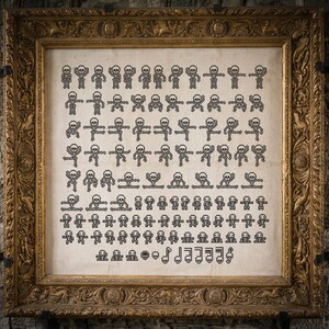 May include: A square, ornate gold frame containing a white fabric panel embroidered with numerous small, black, pixelated skeleton figures in various poses, arranged in rows, ending with musical note symbols featuring skull heads.