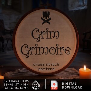 May include: A circular wooden embroidery hoop containing a cross-stitch pattern on white fabric. The design features a black icon above the text Grim Grimoire and the words cross stitch pattern. Text at the bottom specifies 84 characters.