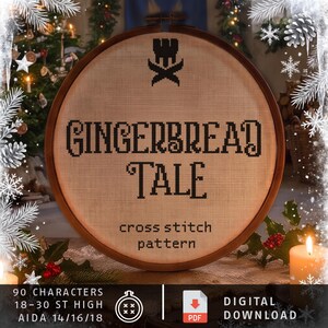 May include: A round wooden embroidery hoop containing a beige fabric with black cross-stitch text that reads Gingerbread Tale, featuring a small castle icon above the text and the words cross stitch pattern printed below.