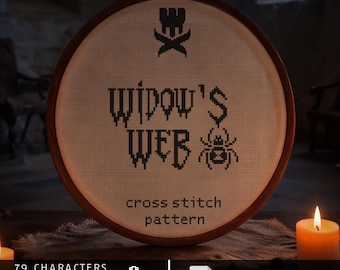 Op de afbeelding: Een ronde houten borduurring met een kruissteekpatroon op gebroken wit stof. Het ontwerp bevat een zwart spinnenicoon, de tekst "WIDOW'S WEB" en "cross stitch pattern" in het zwart. Onderaan staat "79 CHARACTERS", "25-36 ST HIGH", "AIDA 14/16/18" en "DIGITAL DOWNLOAD".