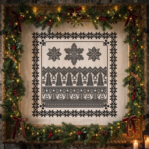 May include: A square cross-stitch embroidery on off-white fabric featuring black geometric snowflake patterns, rows of stylized pine trees, and small bird motifs, framed by a garland of evergreen branches, red berries, and warm fairy lights.
