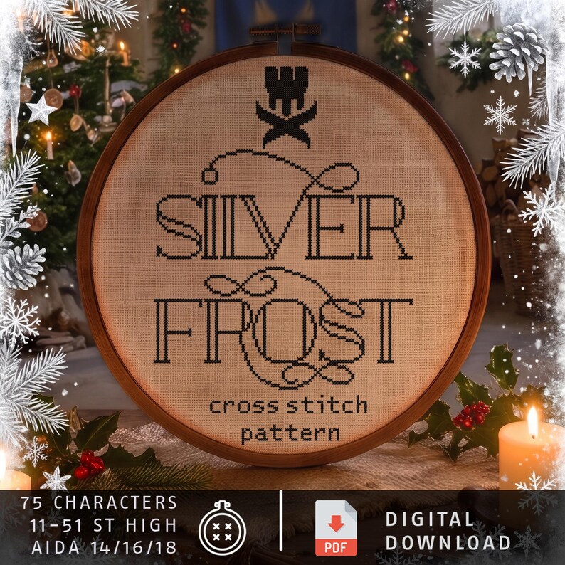 May include: A circular wooden embroidery hoop containing a cross stitch pattern on beige fabric. The design features a black crown icon above the text SILVER FROST and the words cross stitch pattern. Text at the bottom reads 75 CHARACTERS, 11-51 ST HIGH, AIDA 14/16/18.