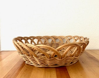 1980's woven natural round wicker low profile basket