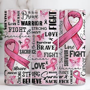 May include: Three pink and white tumblers with a pink ribbon design. The tumblers feature words such as "Survivor", "Brave", "Fight", and "Love", alongside pink butterflies. The tumblers are designed to raise awareness for cancer.