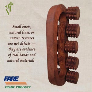 May include: A wooden massage roller with six textured rollers. The frame is curved and the wood has a rich, reddish-brown color. Text on the image reads: "Small knots, natural lines, or uneven textures are not defects — they are evidence of real hands and natural materials."