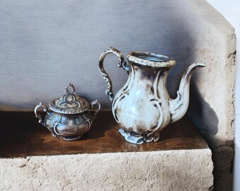 Tetera o azucarero de porcelana vintage RW Bavaria Rudolf Wachter, esmalte jaspeado blanco y negro, porcelana bávara, se vende por separado.