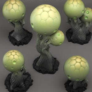 May include: A collection of stylized, light green tree sculptures. Each tree features a spherical, honeycomb-patterned top with a few small holes. The trunks are dark gray and sit on a black, cracked base. The text "ALL PRE-SUPPORTED" is at the top.