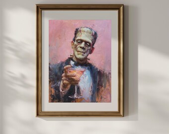 Puede incluir: Obra de arte enmarcada que presenta un retrato del monstruo de Frankenstein sosteniendo un cóctel. La pintura tiene un fondo rosa y un marco dorado. El monstruo viste un traje oscuro y una camisa blanca, sosteniendo una copa de cóctel rosa.