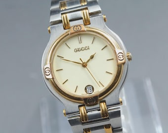 Orologio vintage Gucci 9000 M da 32 mm con quadrante avorio, movimento al quarzo bicolore, unisex, proveniente dal Giappone.