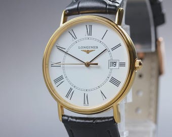Reloj Longines Grand Classic L4.720.2 vintage para hombre, esfera blanca, fecha, 33 mm, fabricado en Suiza.