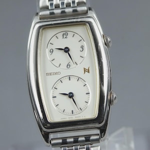 Vintage Seiko Noie 1E20-3A00 Dual Time Silver Dam Quartzklocka Från Japan