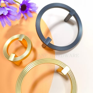 ストライプ柄のブラッシュゴールドキャビネットプル、円形引き出しハンドル、グレー食器棚ドアハンドル、キッチンハードウェア