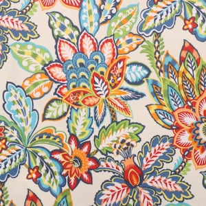 May include: A colorful floral fabric with a paisley pattern in shades of red, orange, yellow, green, blue, and white on a cream background.