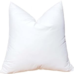 May include: A large, square white pillow. The pillow is made of a soft, smooth fabric and is filled with a fluffy material. The pillow is designed for comfort and support, suitable for use on a bed or sofa.