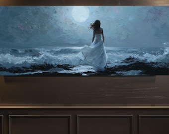 May include: An oil painting depicts a woman in a white dress standing on a rocky shore, facing the ocean under a full moon. The artwork uses shades of blue and white to create a dramatic seascape. The woman's hair and dress are blowing in the wind.