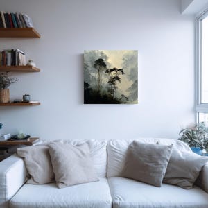 May include: Square canvas art depicting a misty forest scene. The artwork features tall, dark trees emerging from a shadowy foreground, with a soft, diffused light filtering through the upper portion of the image. The color palette is muted, with shades of gray, black, and beige.