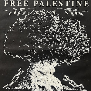 May include: Black and white graphic featuring the text "FREE PALESTINE" above a detailed illustration of a tree with chains. The tree's branches are adorned with leaves, and chains are depicted on either side of the tree's trunk.