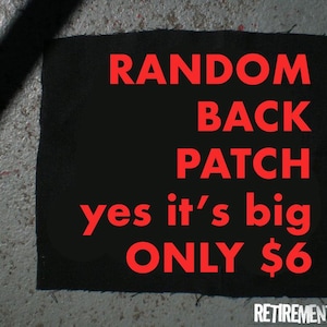 May include: Black square patch with red text: "RANDOM BACK PATCH yes it's big ONLY $6". The patch has a rough edge and the words "RETIREMENT FUND" are at the bottom. The background is a textured gray surface.