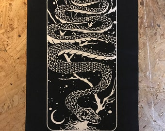 PARCHE DE ESPALDA serpiente astral ooh emocionante porque es como el pequeño pero ahora más grande