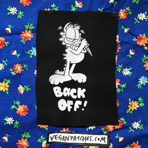 PATCH TERUG. Waarom zou je deze grappige cartoonkat niet gebruiken als icoon voor intimidatie?