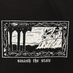 SMASH THE STATE patch with a medieval looking castle on fire because kings are the wooorst image 2