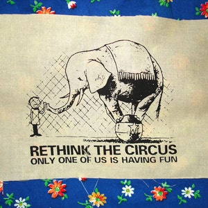 May include: Black and white illustration of an elephant balancing on a ball with a small person standing next to it. The text reads "Rethink the circus. Only one of us is having fun."