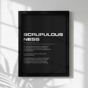 Peut inclure: Impression encadrée en noir avec le mot "SCRUPULOUSNESS" en lettres argentées. La définition de la scrupulosité est fournie en dessous, décrivant la qualité d'être méticuleux et moralement attentif dans ses actions.