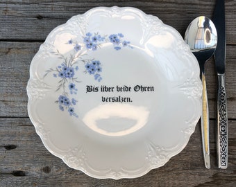 Saying plate "Up to my ears...", porcelain with floral decoration in blue and hand-printed saying; Dearest, gift, surprise