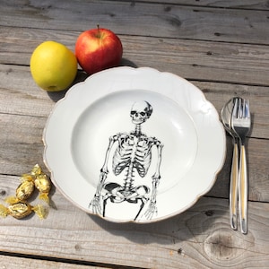 Pasta plate &quot;Bone Man&quot;, approx. 24 cm, gold-rimmed porcelain with handmade screen-printed motif; anatomy, Halloween, gift