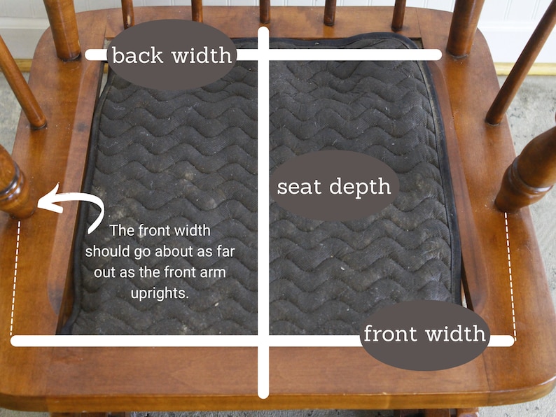 May include: A close-up of a wooden rocking chair with a black fabric seat cushion. The image shows the measurements for the back width, seat depth, and front width of the chair.