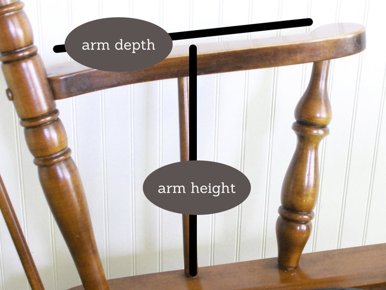 May include: A wooden rocking chair with a brown finish. The chair has a high back and arms. The arm depth and height are labeled in the image.