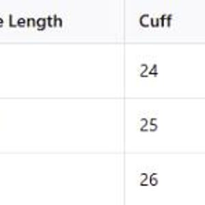 May include: A white table of clothing measurements, including size, length (72 inches), chest (112 inches), sleeve length (36 inches), cuff (24 inches), pant length (98 inches), hip (114 inches), and leg opening (22 inches).