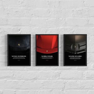 Puede incluir: Tres impresiones artísticas enmarcadas de automóviles. Las impresiones presentan primeros planos de capós de coches de lujo en negro, rojo y negro. Cada impresión tiene una cita motivacional: "NO PAIN, NO PORSCHE", "NO RISK, NO RARL" y "NO LOSS, NO LAMBO".