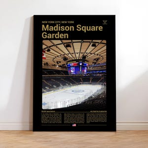 May include: A black poster featuring gold text and an interior view of Madison Square Garden in New York City. The poster includes the text "Madison Square Garden" and a hockey stick icon. The interior shows an ice rink and stadium seating.