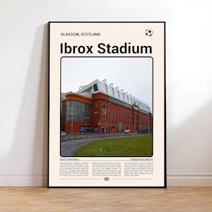 May include: A framed poster featuring Ibrox Stadium in Glasgow, Scotland. The image shows the stadium's exterior with red brick and blue accents. Text at the top reads "Ibrox Stadium" and includes the location and a soccer ball icon. Additional text is at the bottom.