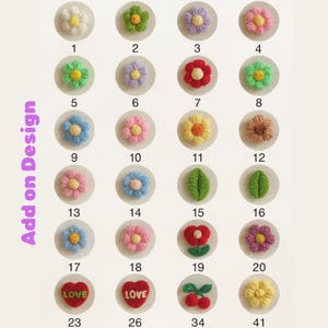 May include: A collection of embroidered floral and leaf designs in various colors, including white, green, pink, and yellow. The designs are numbered and arranged on a light background. The text "Add on Design" is visible.